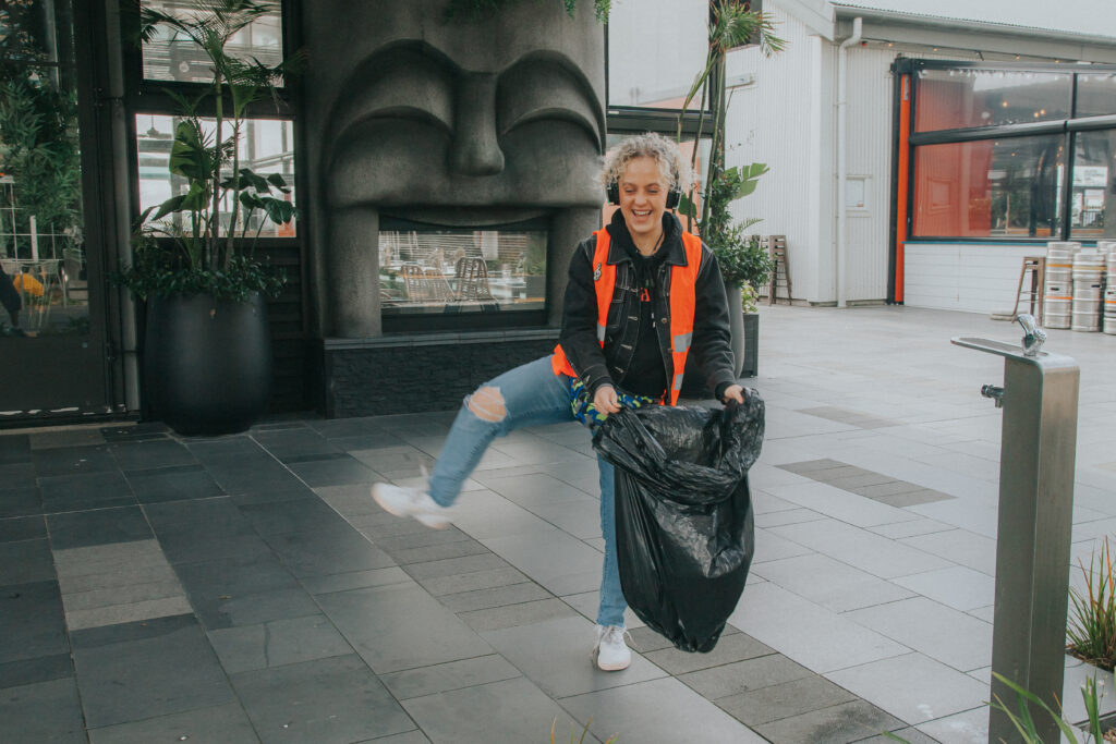 dancing and picking up rubbish at silent disco clean up